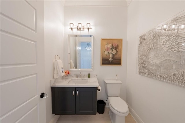 2501 S Dundee St, Tampa, FL 33629 - half bath with vanity, toilet, and baseboards