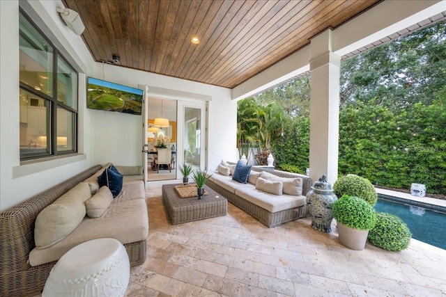 2501 S Dundee St, Tampa, FL 33629 - view of patio / terrace with an outdoor living space and an outdoor pool