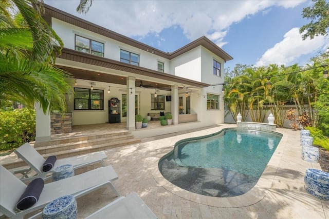 2501 S Dundee St, Tampa, FL 33629 - back of property featuring stucco siding, a patio, a ceiling fan, and a fenced backyard