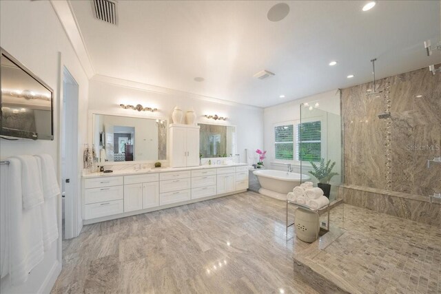 2501 S Dundee St, Tampa, FL 33629 - full bathroom with walk in shower, a freestanding tub, vanity, recessed lighting, and ornamental molding
