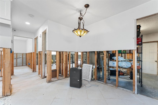 miscellaneous room with light tile patterned flooring
