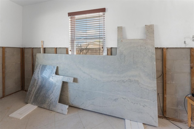 bathroom featuring tile patterned flooring