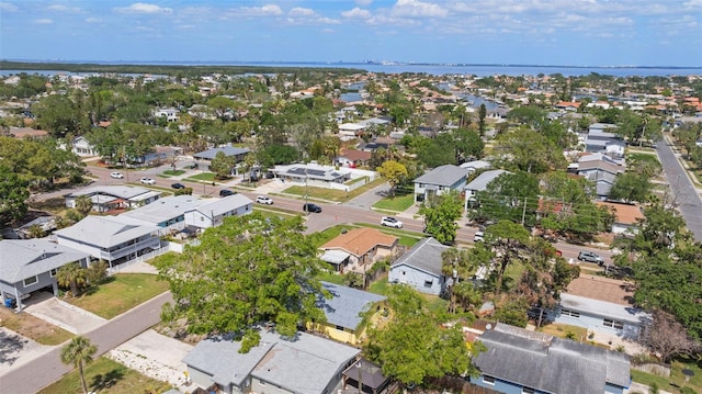 aerial view with a water view and a residential view