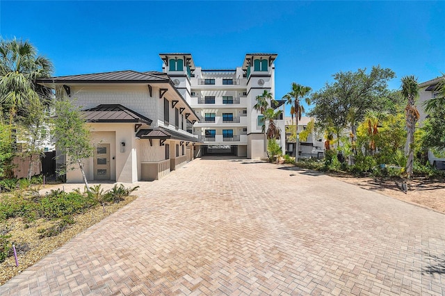 455 Pinellas Bayway S Unit 4A, Tierra Verde, FL 33715 - view of building exterior with decorative driveway