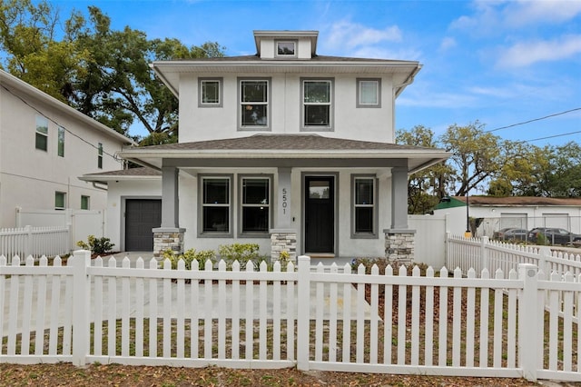 5501 N 15th St, Tampa, FL 33610 - view of front of home featuring a porch, stucco siding, and a fenced front yard