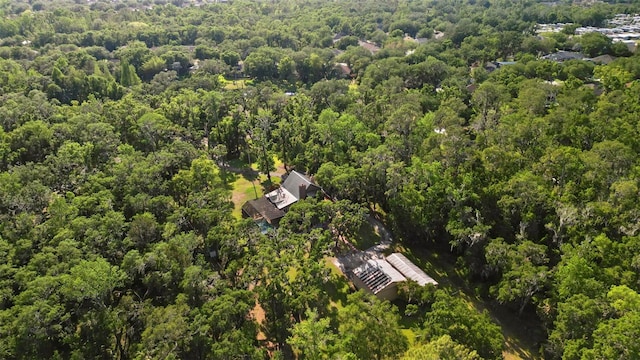 bird's eye view featuring a forest view