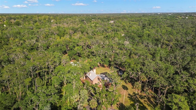 drone / aerial view with a forest view