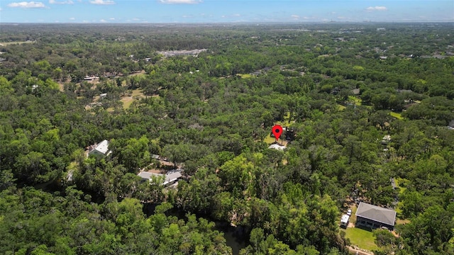 aerial view with a wooded view
