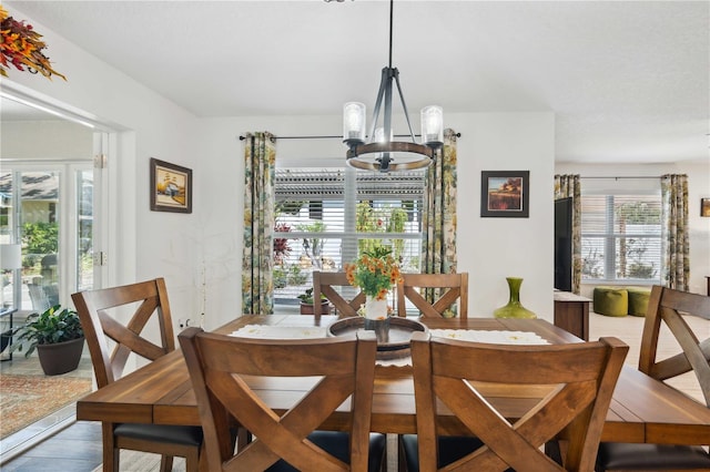 dining area with a chandelier