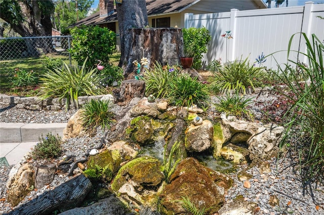 view of yard featuring fence