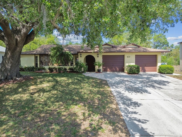 11383 Pickford St, Spring Hill, FL 34609 - ranch-style home with a garage, driveway, a front lawn, and stucco siding