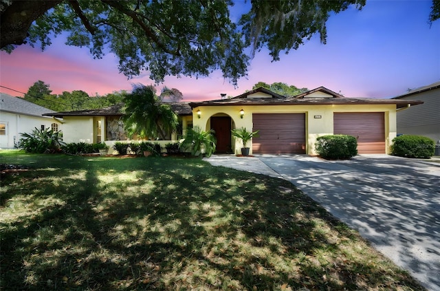 11383 Pickford St, Spring Hill, FL 34609 - ranch-style home featuring concrete driveway, stucco siding, and a garage