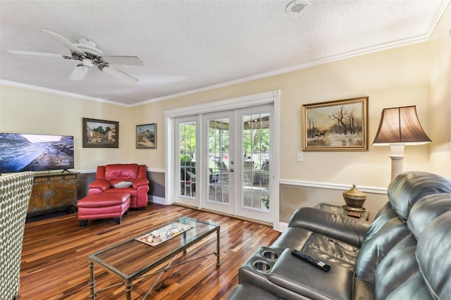 11383 Pickford St, Spring Hill, FL 34609 - living room featuring crown molding, a ceiling fan, a textured ceiling, and wood finished floors