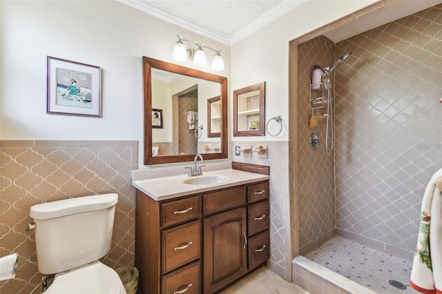 11383 Pickford St, Spring Hill, FL 34609 - full bathroom with wainscoting, vanity, toilet, ornamental molding, and tiled shower