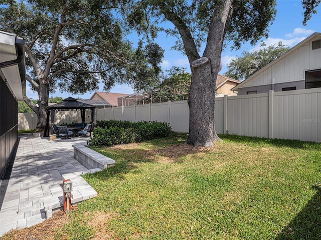 1830 Citrus Orchard Way, Valrico, FL 33594 - view of yard with a patio area, a gazebo, and a fenced backyard