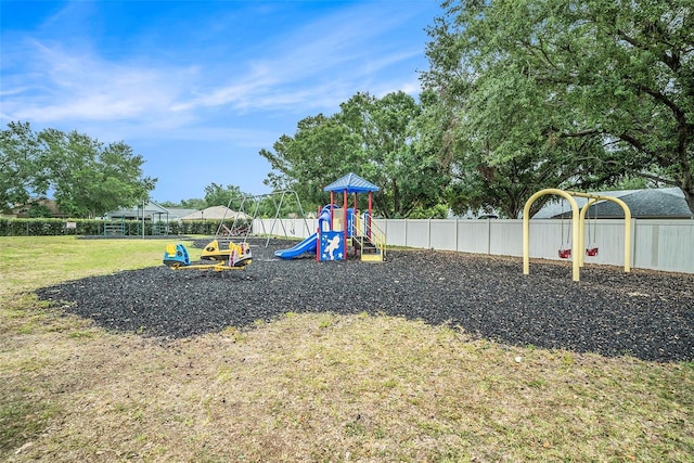 1830 Citrus Orchard Way, Valrico, FL 33594 - communal playground featuring a lawn and fence