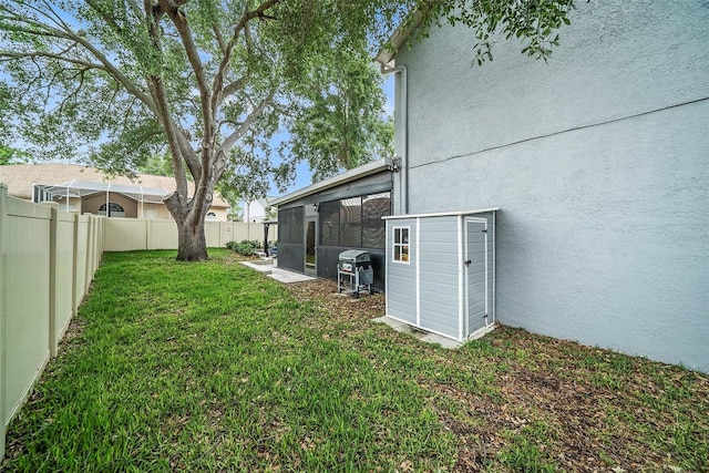 1830 Citrus Orchard Way, Valrico, FL 33594 - view of yard featuring a sunroom and a fenced backyard