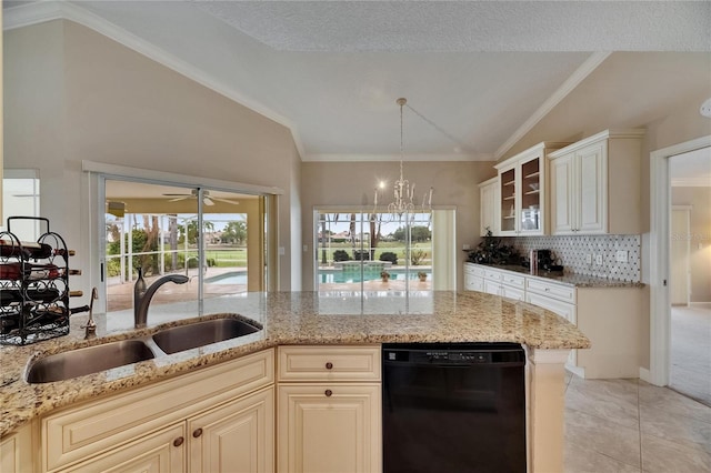 kitchen with vaulted ceiling, black dishwasher, light stone counters, a sink, and decorative backsplash