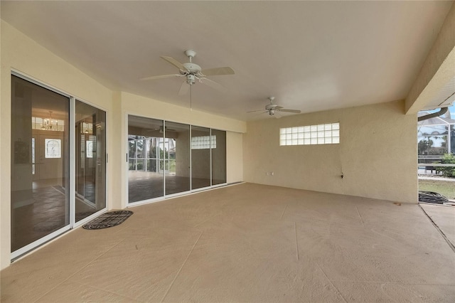 view of patio featuring ceiling fan