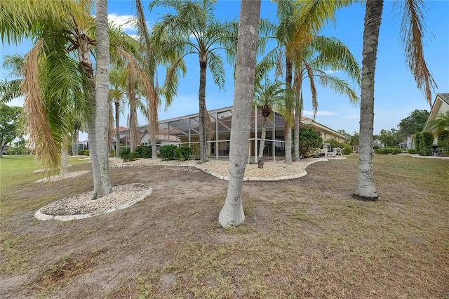 view of yard featuring a lanai