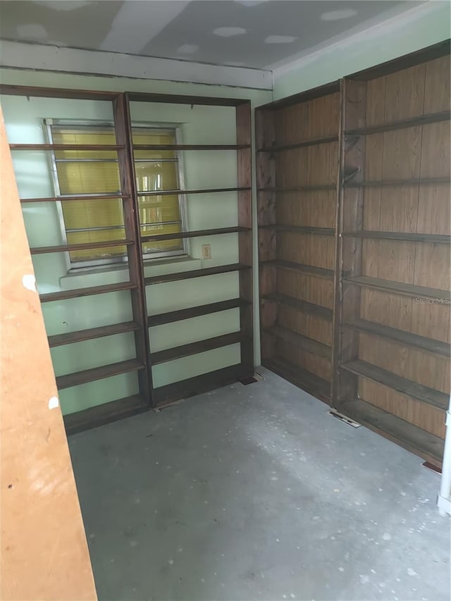 interior space featuring concrete floors