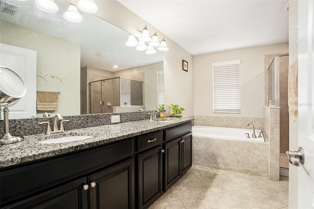11818 Valhalla Woods Dr, Riverview, FL 33579 - full bath featuring a shower stall, a bath, double vanity, and tile patterned flooring