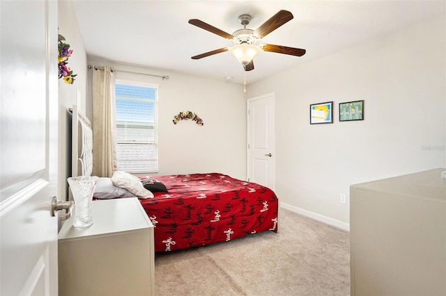 11818 Valhalla Woods Dr, Riverview, FL 33579 - bedroom with light carpet, baseboards, and a ceiling fan