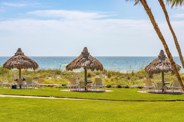 1400 Gulf Blvd Unit 511, Clearwater Beach, FL 33767 - surrounding community featuring a water view, a gazebo, and a lawn