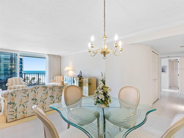 1400 Gulf Blvd Unit 511, Clearwater Beach, FL 33767 - dining space featuring a chandelier, crown molding, light tile patterned floors, and a textured ceiling