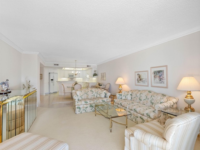 1400 Gulf Blvd Unit 511, Clearwater Beach, FL 33767 - living room featuring ornamental molding, a chandelier, light carpet, and a textured ceiling