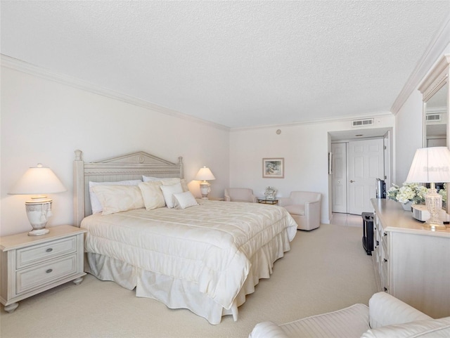 1400 Gulf Blvd Unit 511, Clearwater Beach, FL 33767 - bedroom featuring light carpet, visible vents, a textured ceiling, and crown molding