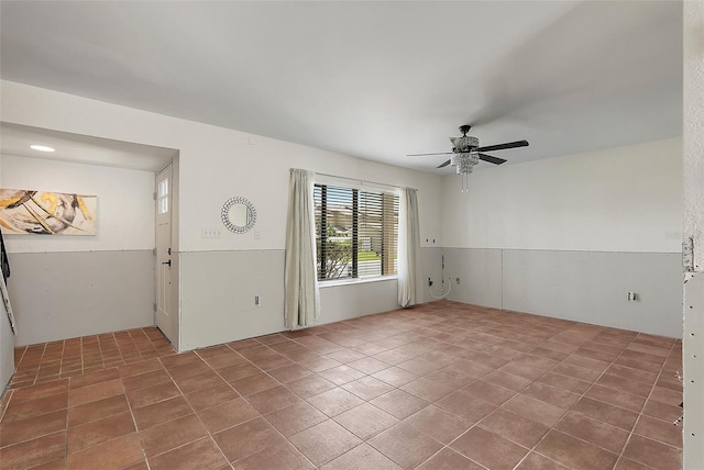 6490 Cape Hatteras Way NE Unit 4, Saint Petersburg, FL 33702 - unfurnished room with ceiling fan and tile patterned flooring