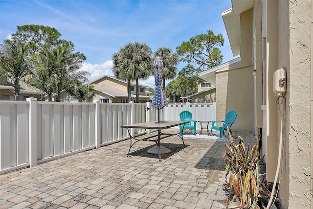 6490 Cape Hatteras Way NE Unit 4, Saint Petersburg, FL 33702 - view of patio / terrace featuring fence
