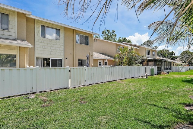 6490 Cape Hatteras Way NE Unit 4, Saint Petersburg, FL 33702 - view of yard with a gate and a fenced front yard