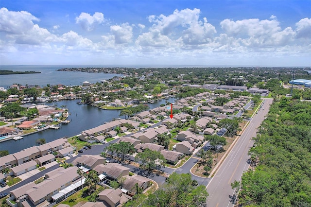 6490 Cape Hatteras Way NE Unit 4, Saint Petersburg, FL 33702 - drone / aerial view with a water view and a residential view