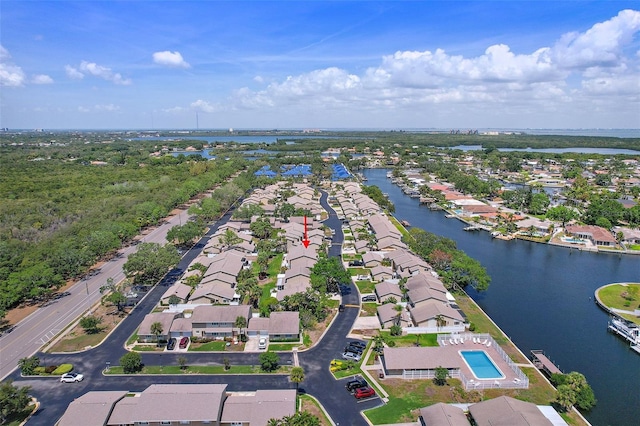 6490 Cape Hatteras Way NE Unit 4, Saint Petersburg, FL 33702 - birds eye view of property featuring a water view and a residential view