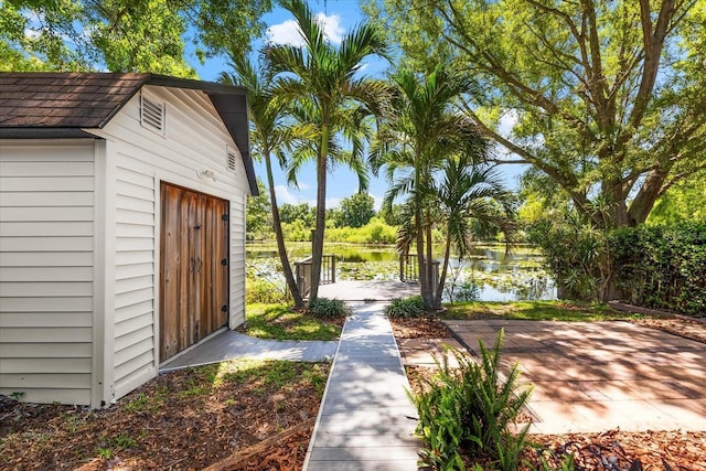 view of shed featuring a water view