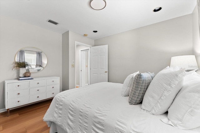 1232 Sedeeva Cir S, Clearwater, FL 33755 - bedroom with wood finished floors