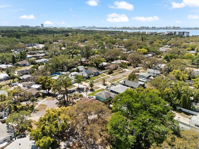 1232 Sedeeva Cir S, Clearwater, FL 33755 - aerial perspective of suburban area featuring a large body of water and a tree filled landscape
