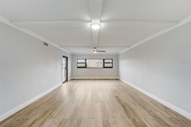 unfurnished living room with crown molding, ceiling fan, light wood-style flooring, visible vents, and baseboards