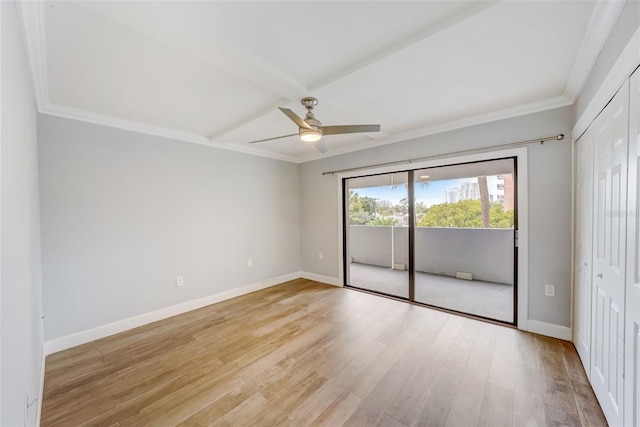 unfurnished bedroom featuring a closet, baseboards, access to exterior, ceiling fan, and light wood finished floors