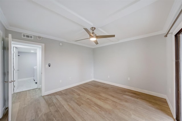 unfurnished bedroom featuring baseboards, light wood-style flooring, crown molding, a ceiling fan, and visible vents