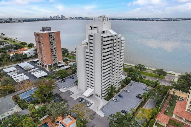 bird's eye view featuring a water view and a city view