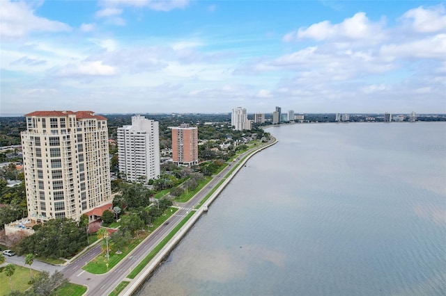 drone / aerial view with a water view and a view of city