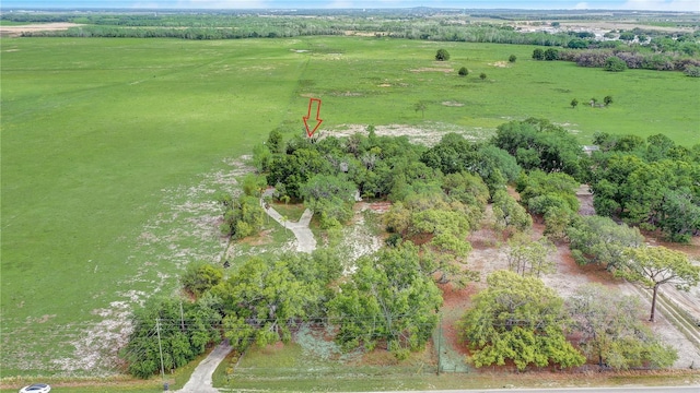birds eye view of property featuring a rural view