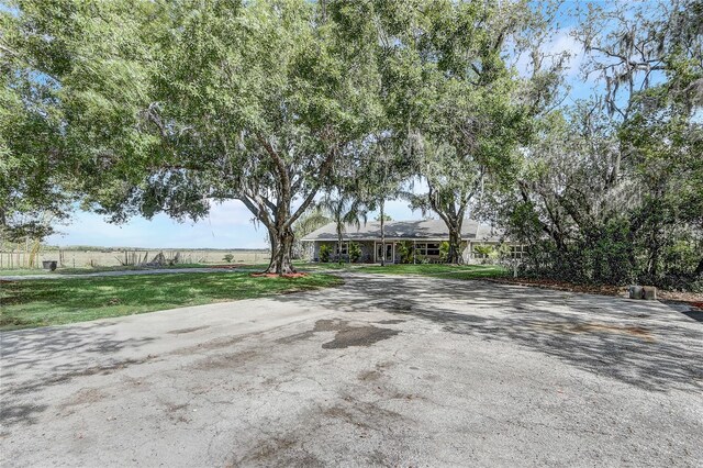 exterior space with a front lawn