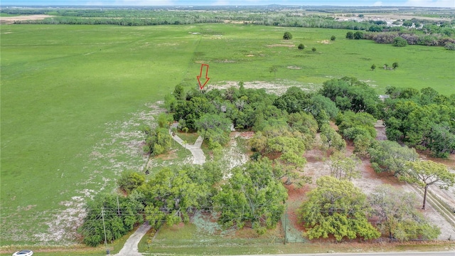 birds eye view of property featuring a rural view