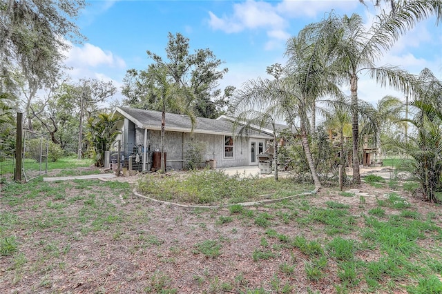 back of house with a patio