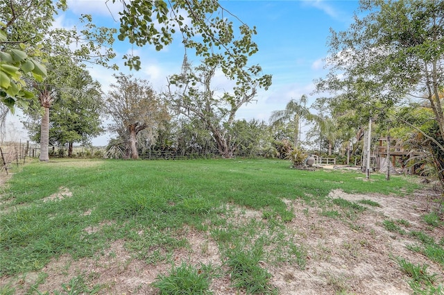 view of yard with fence