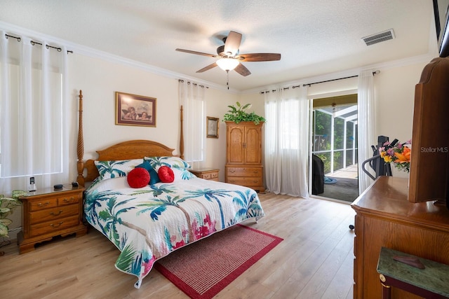 bedroom featuring access to outside, light wood-style flooring, crown molding, and a ceiling fan